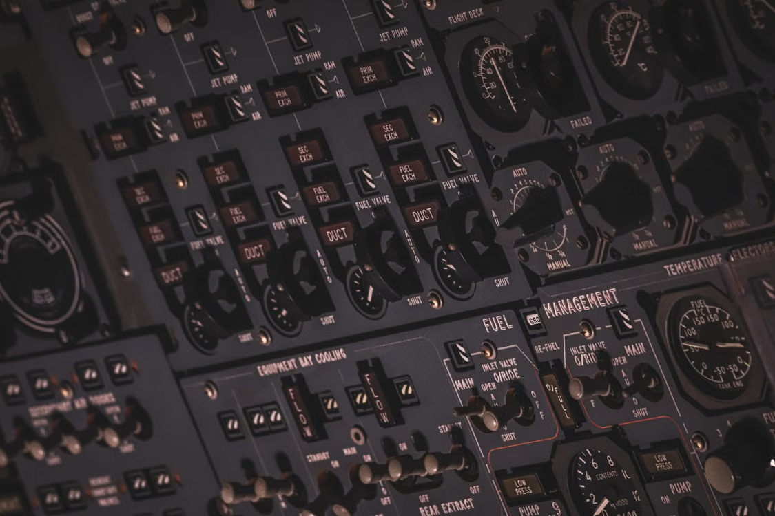Aircraft overhead panel switches and gauges